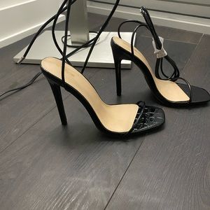 Strappy black heels